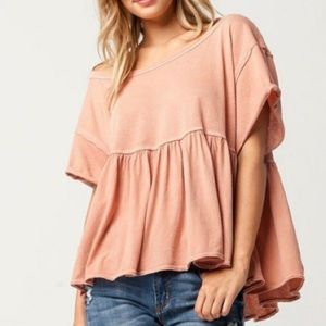 Free People peplum Odyssey top, color is Blush.